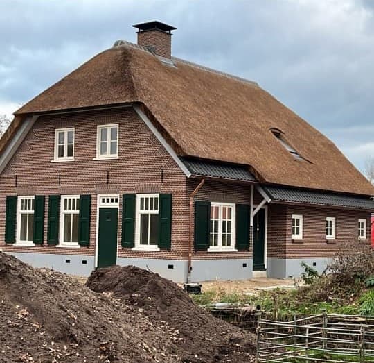 Boerderijwoning met siermetselwerk foto 1