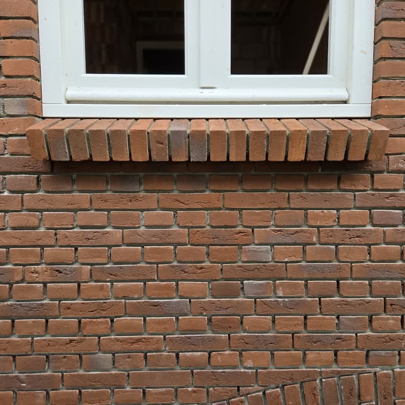 Boerderijwoning met siermetselwerk foto 3