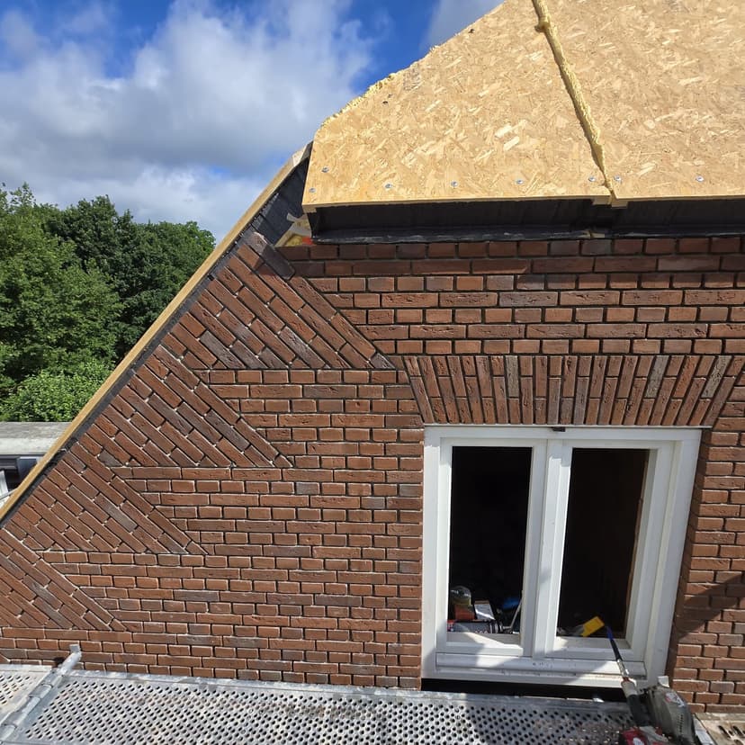 Boerderijwoning met siermetselwerk foto 4