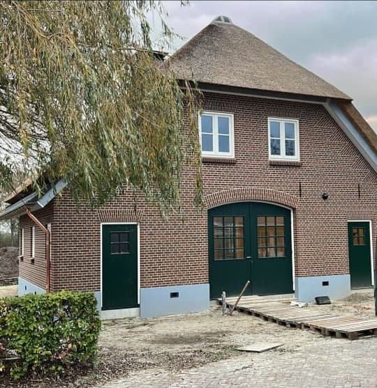 Boerderijwoning met siermetselwerk foto 2